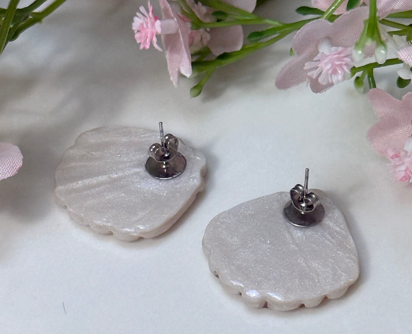 Puces d'oreilles Coquillage
