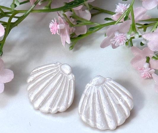Puces d'oreilles Coquillage