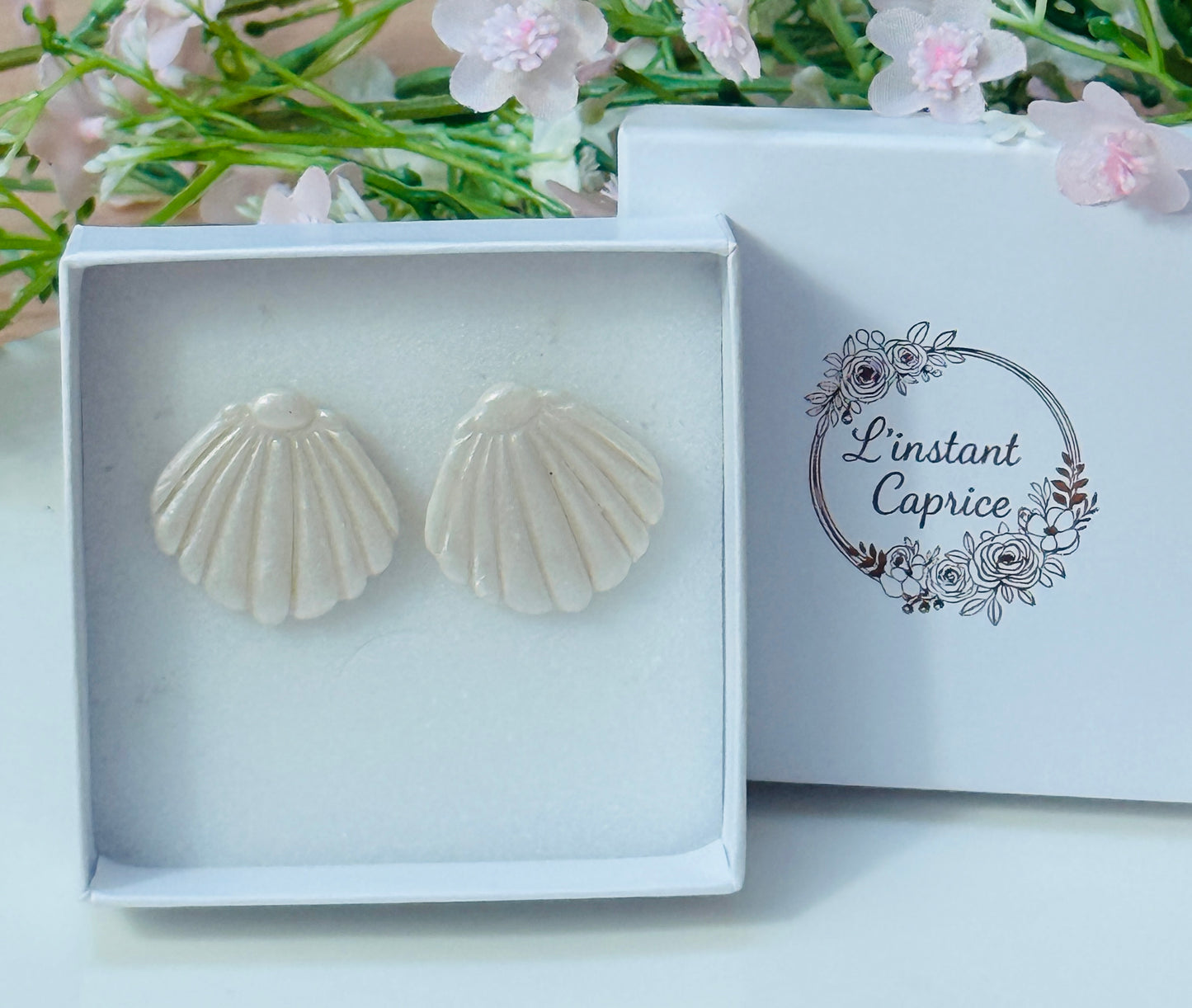 Puces d'oreilles Coquillage